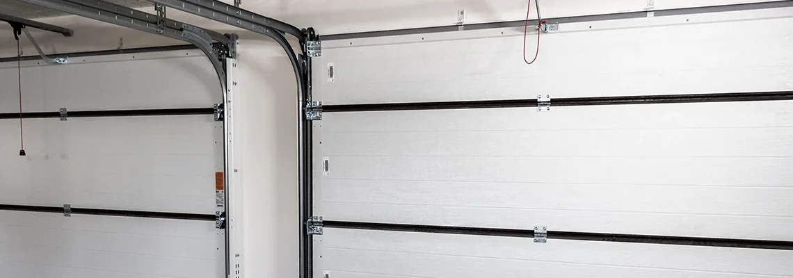 Fix Folding Garage Door Jerking in Saint John, New Brunswick