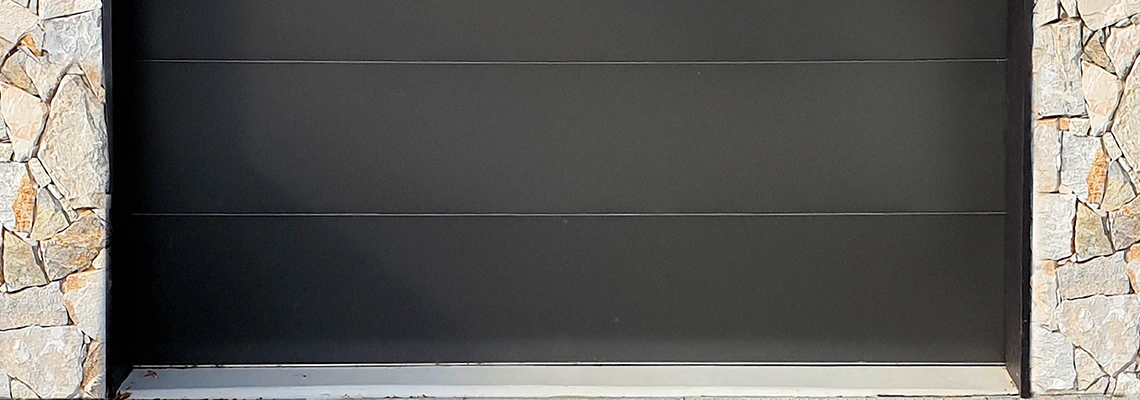 Overhead Black Garage Door Installation in Saint John, New Brunswick