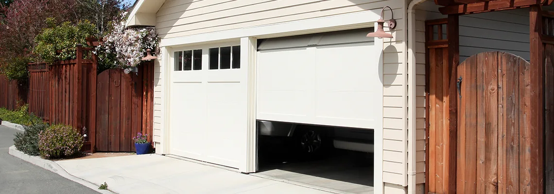 Fix Metal Garage Door Jerking in Saint John, New Brunswick